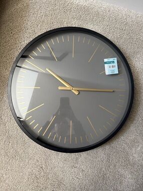 The Spring Shop Black and Gold Minimalist Wall Clock